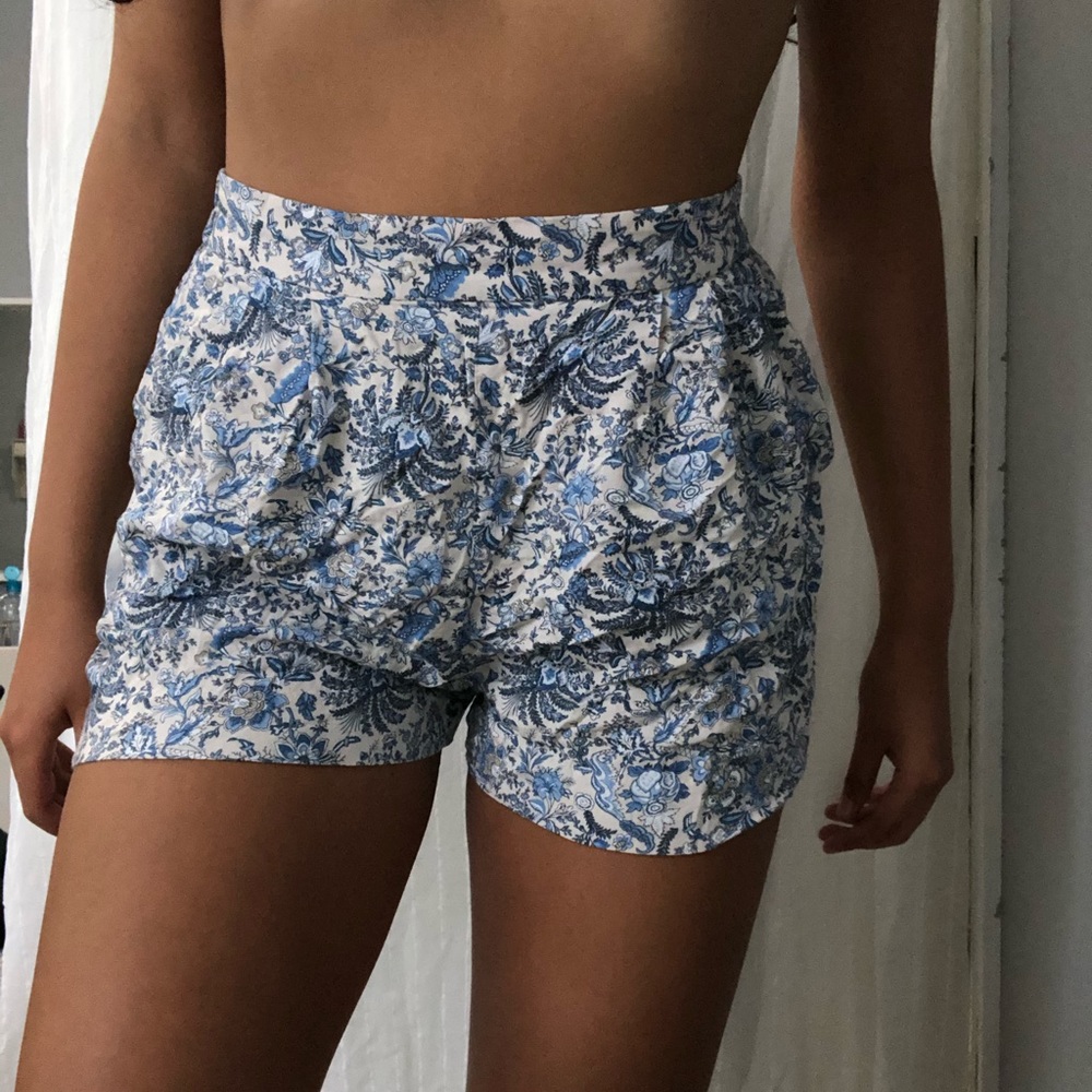 blue and white flowy patterned shorts with pockets